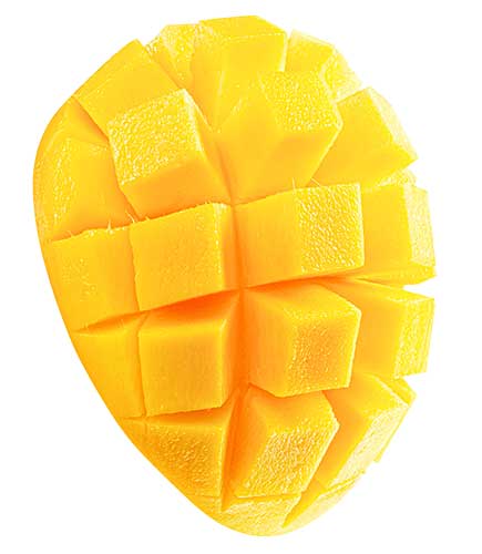 A half mango with its flesh cut into cubes, displaying a grid pattern.